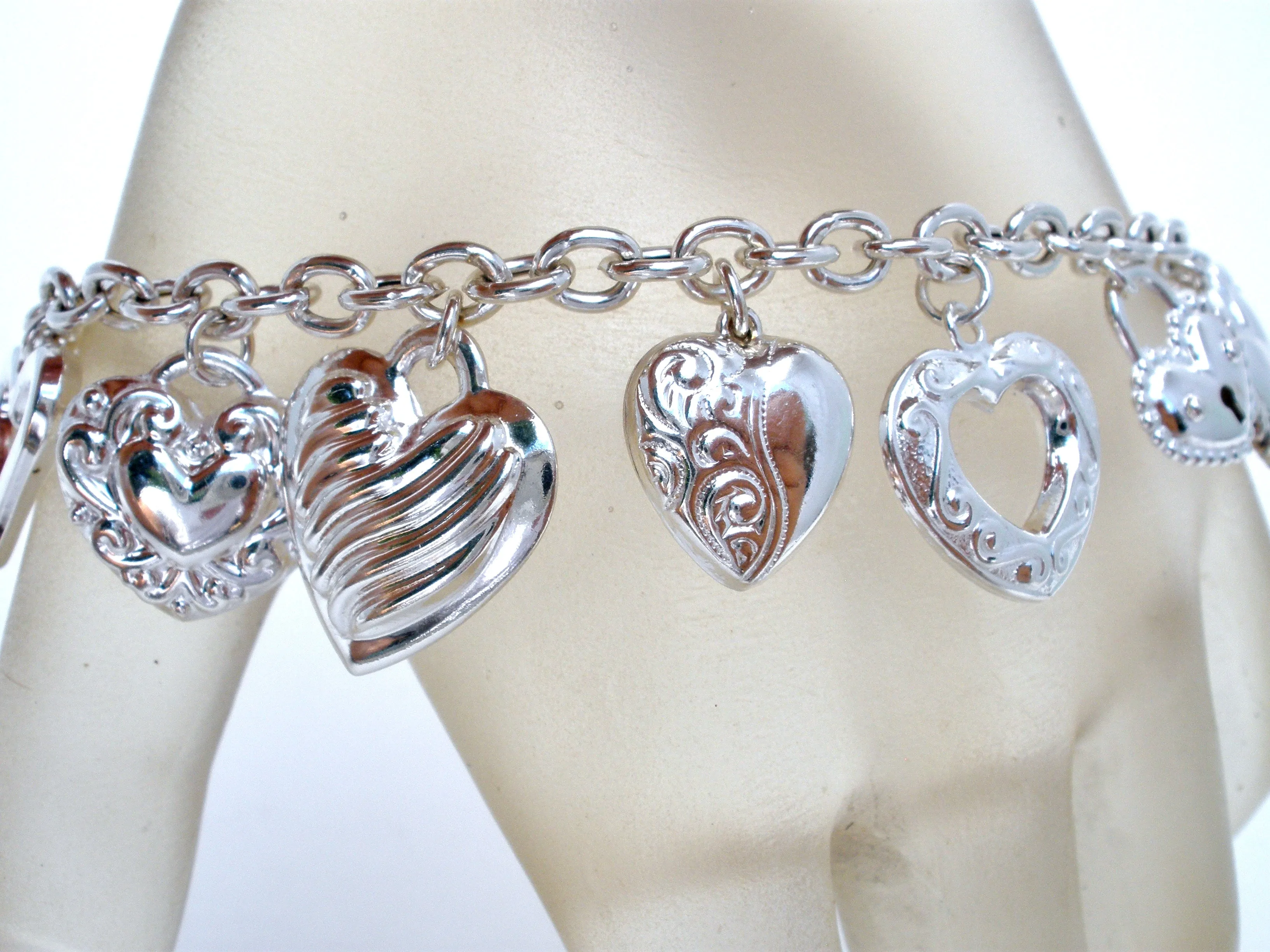 Sterling Silver Charm Bracelet with Hearts JCM